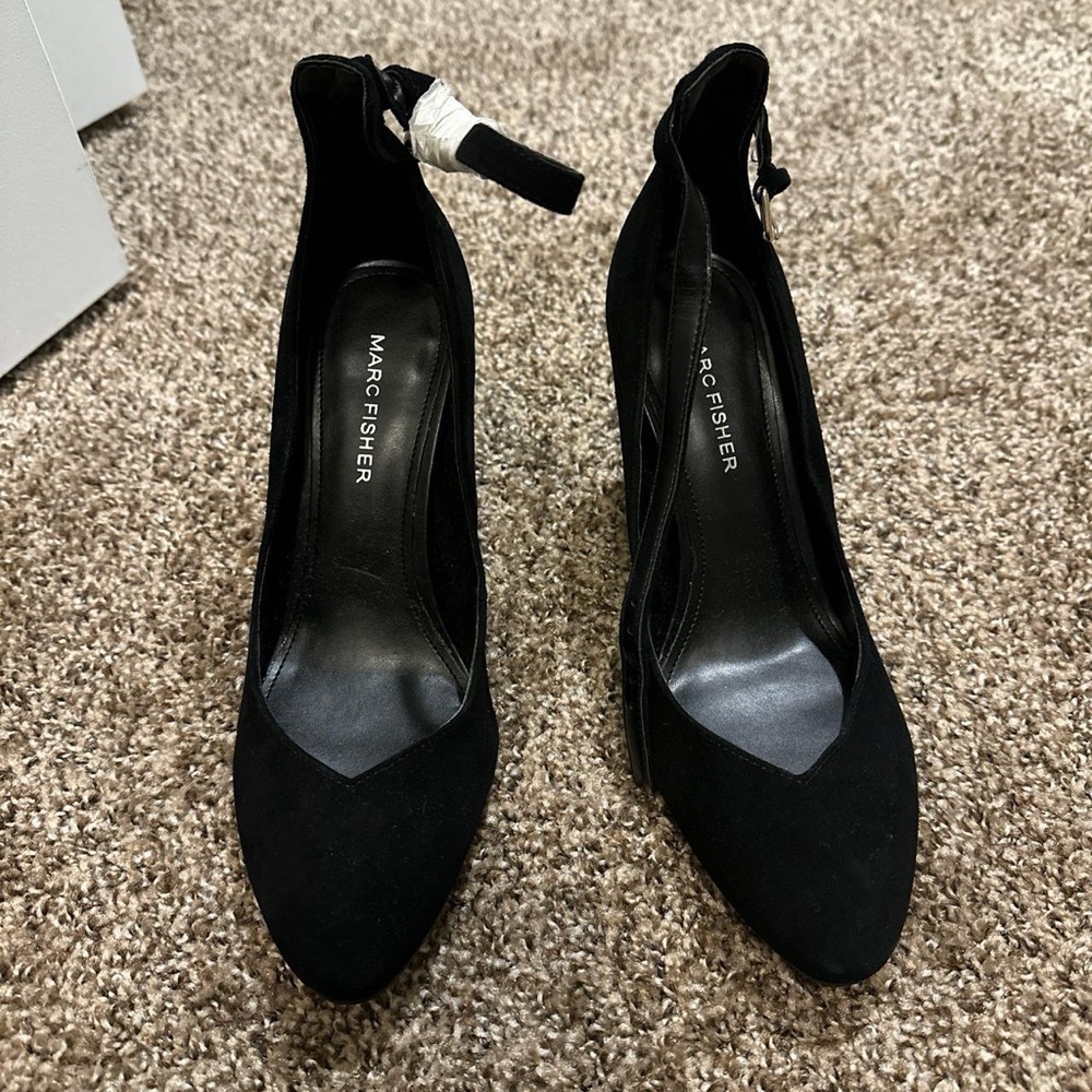 Black suede pumps
